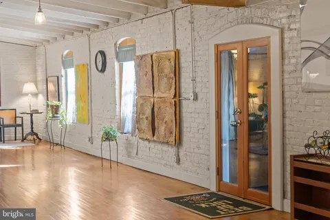 a very nice looking living room with a large window