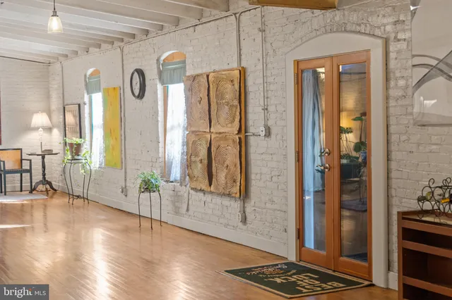 a very nice looking living room with a large window