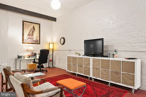a car and bike parked in a garage
