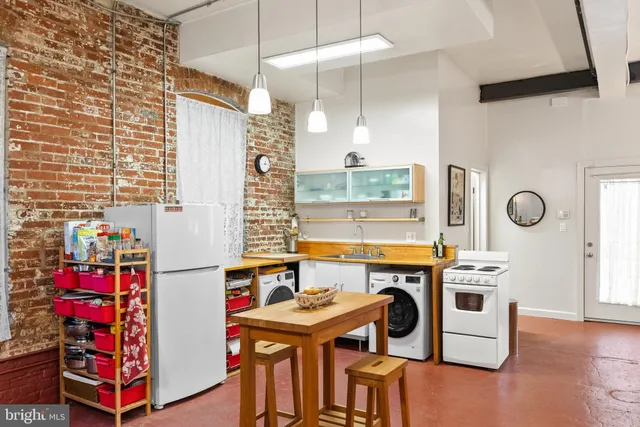 a front view of a building with a garage