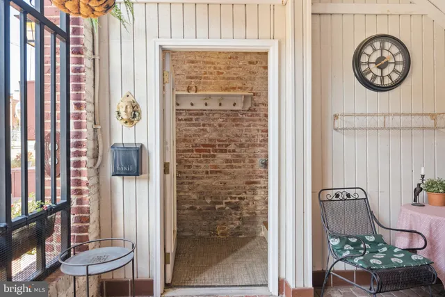 a dining table with chairs and wooden floor