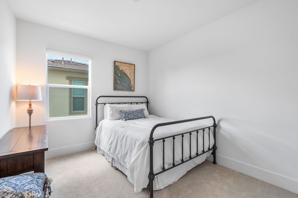 32166 Verbena Way Temecula, CA 92591 - Photo 29 of 47 a bedroom with a bed and a window