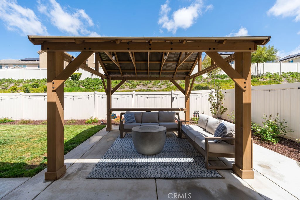 32166 Verbena Way Temecula, CA 92591 - Photo 32 of 47 a view of porch with furniture and garden