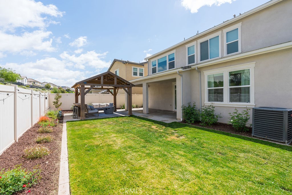 32166 Verbena Way Temecula, CA 92591 - Photo 35 of 47 a house view with a garden space