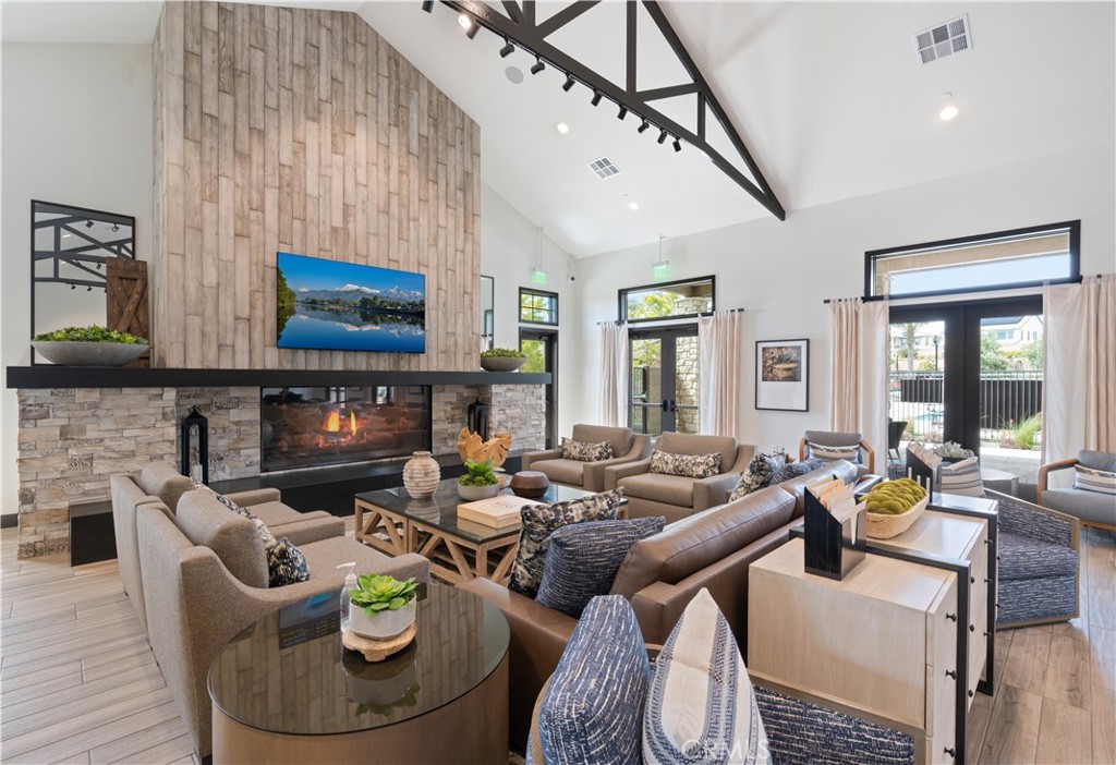 32166 Verbena Way Temecula, CA 92591 - Photo 40 of 47 a living room with furniture and a flat screen tv