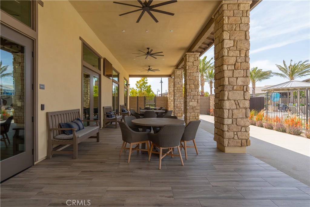 32166 Verbena Way Temecula, CA 92591 - Photo 41 of 47 a view of a dining room with furniture window and wooden floor