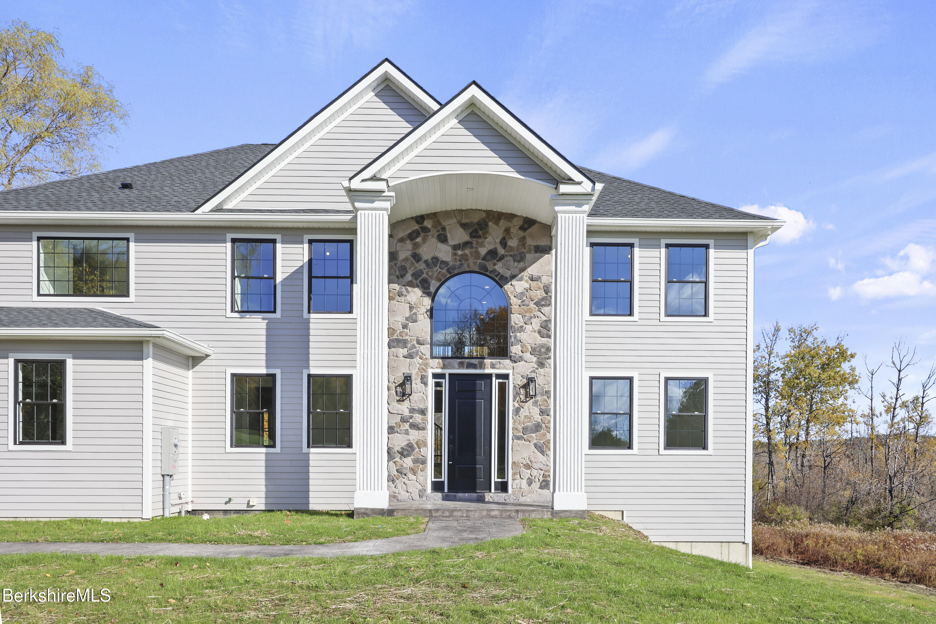 8 Northbrook Lane Pittsfield, MA 01201 - Photo 5 of 90 a front view of a house with a yard