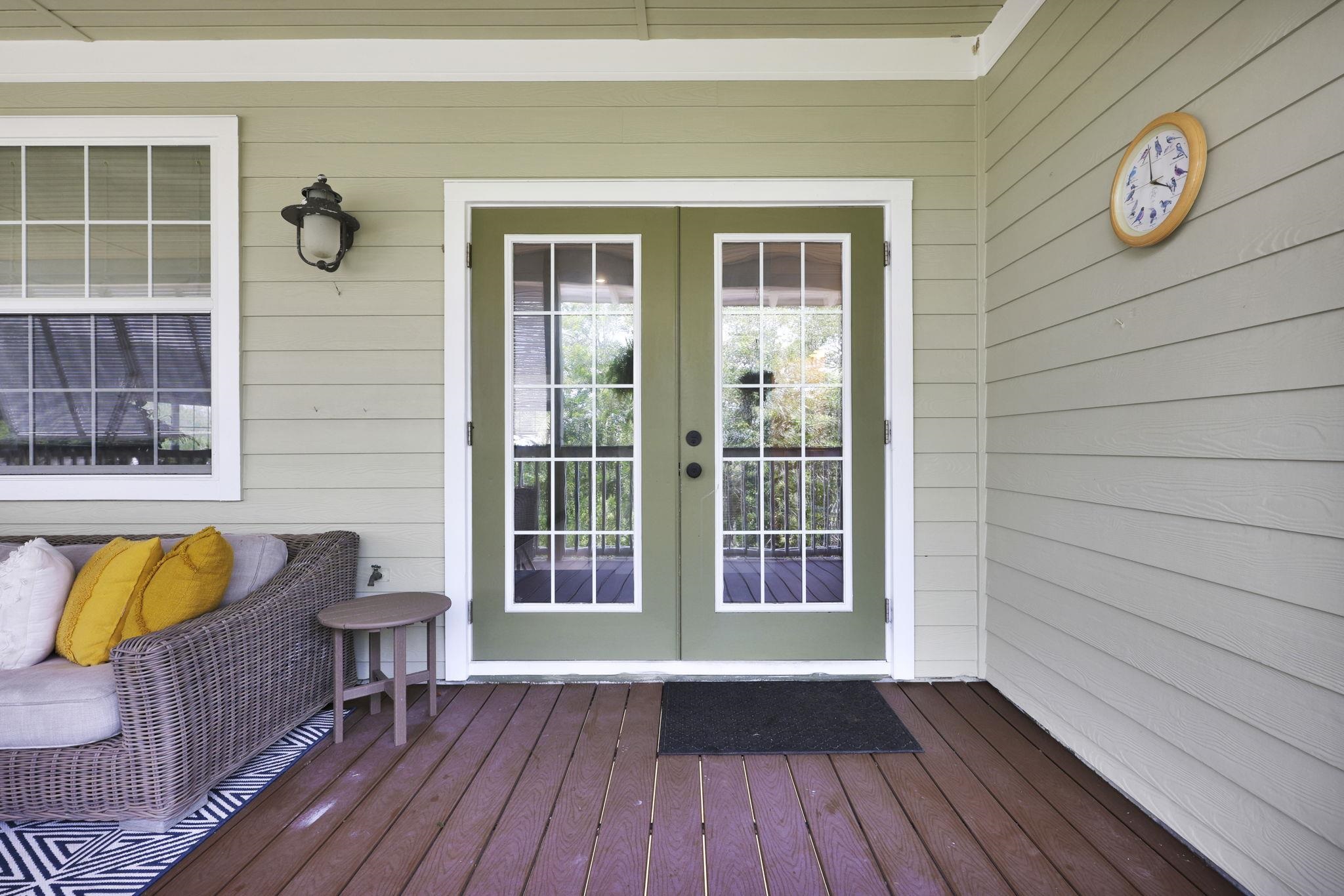 311 Weff Road St. Augustine, FL 32080 - Photo 22 of 65 a view of outdoor space with wooden floor and windows