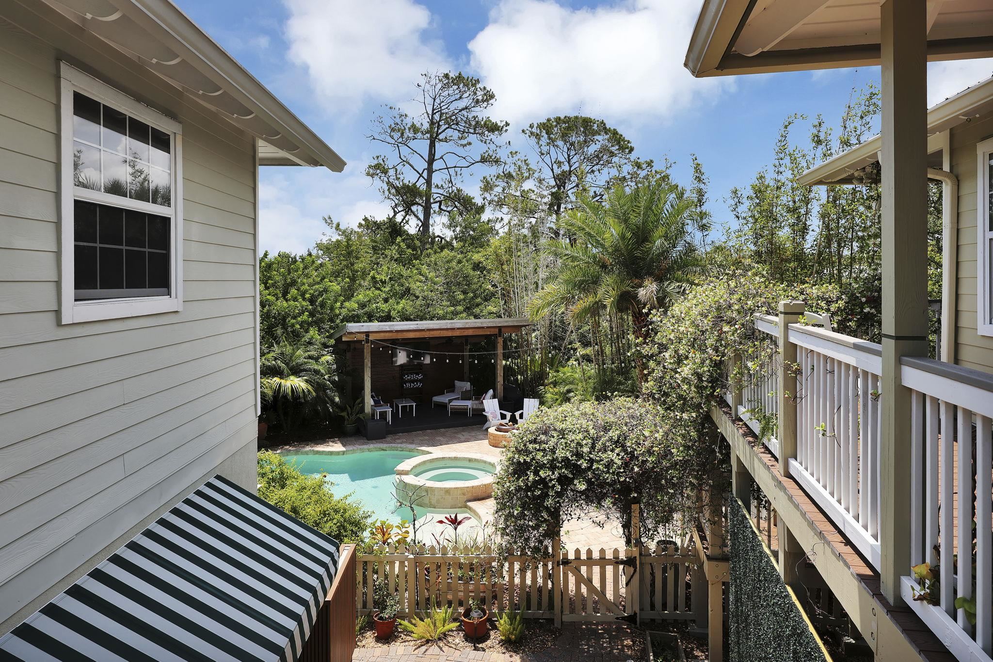 311 Weff Road St. Augustine, FL 32080 - Photo 48 of 65 a view of a house with backyard and porch