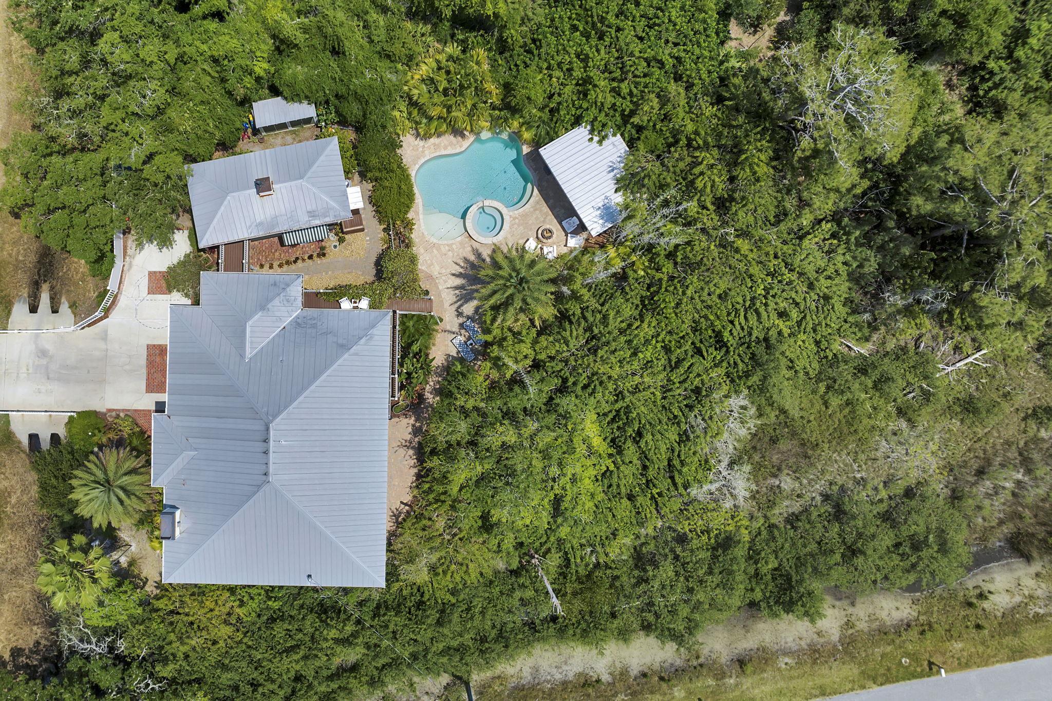 311 Weff Road St. Augustine, FL 32080 - Photo 56 of 65 an aerial view of residential house with outdoor space and trees all around