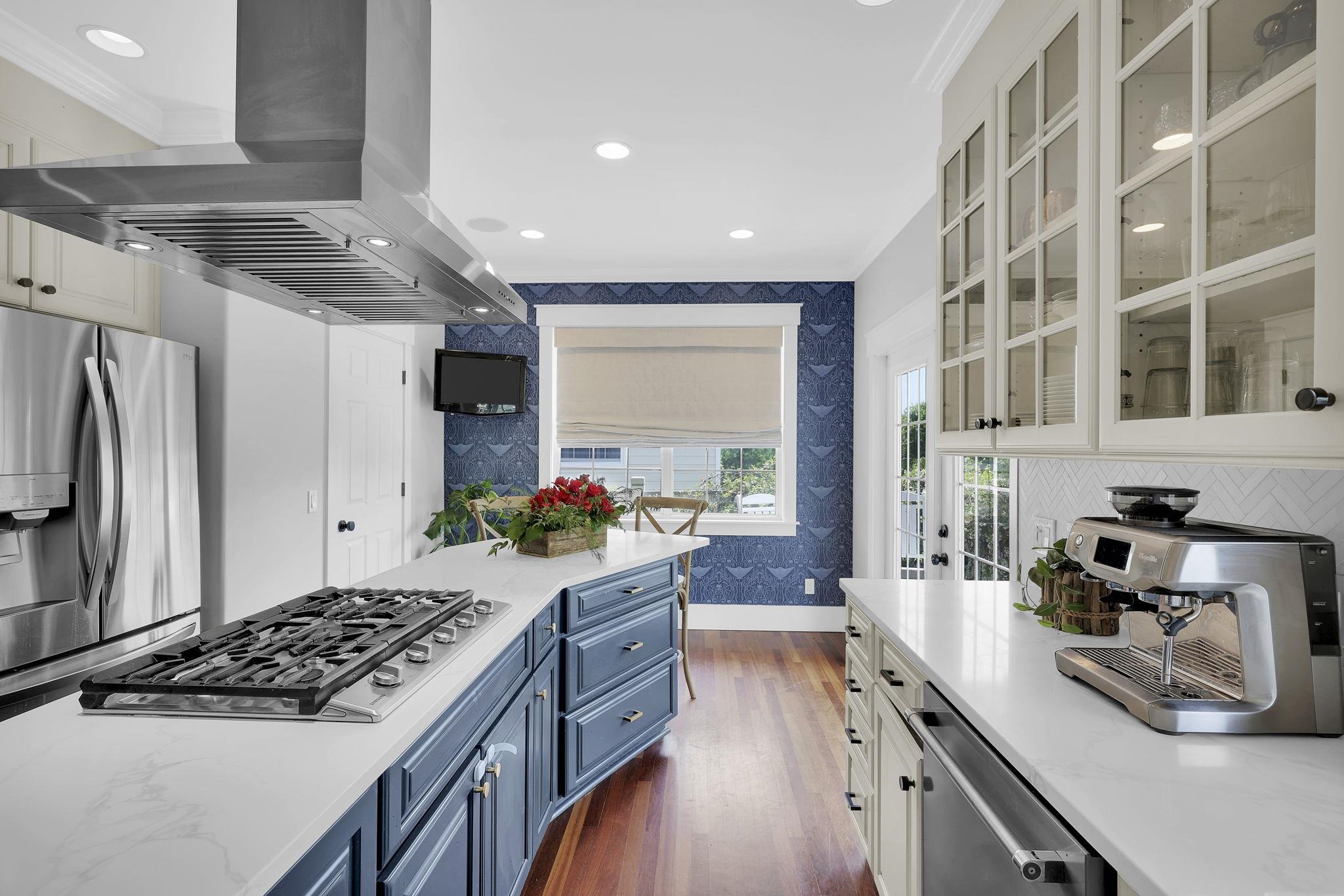 311 Weff Road St. Augustine, FL 32080 - Photo 6 of 65 a kitchen with stove and refrigerator