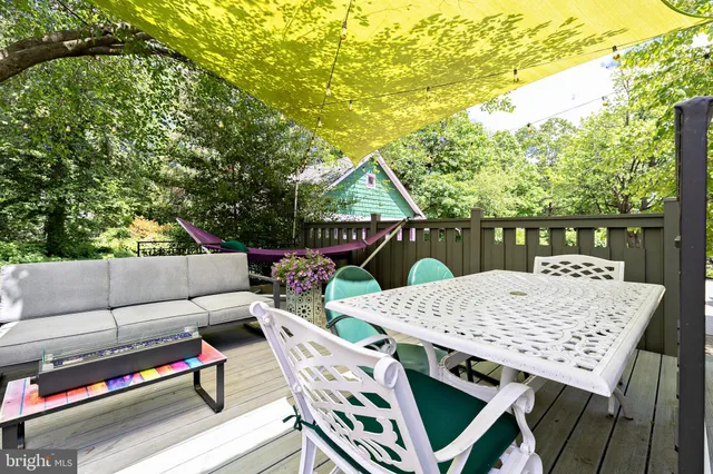 a view of fireplace with two chairs