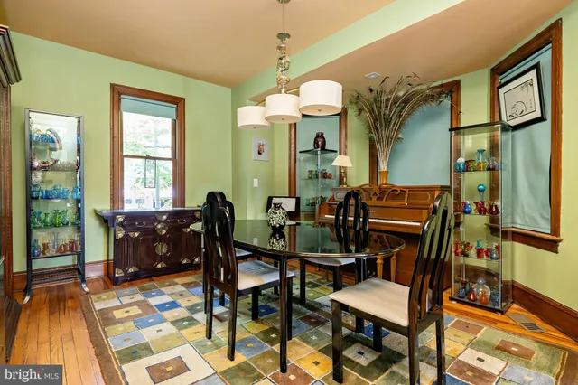 a kitchen with a stove a sink and a microwave