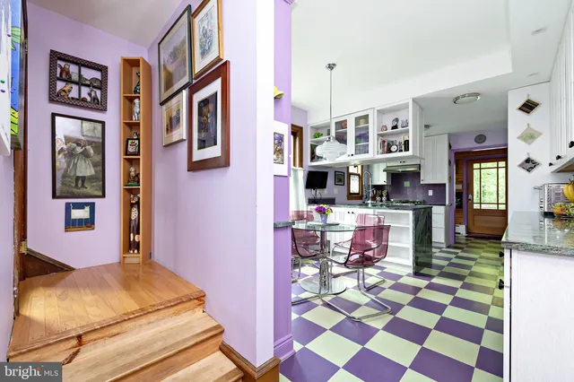 a view of a bathroom sink and a mirror