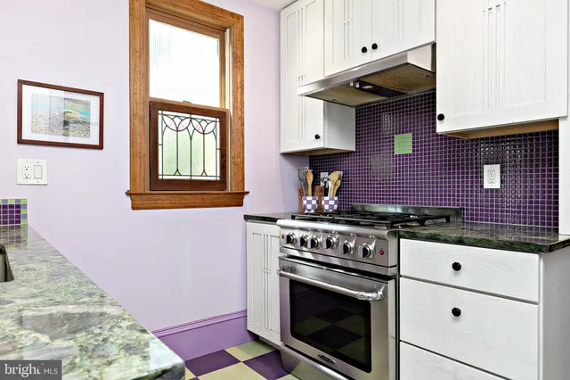a view of bathroom with a shower and a sink