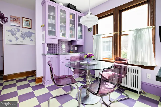 a bedroom with a bed and a book shelf