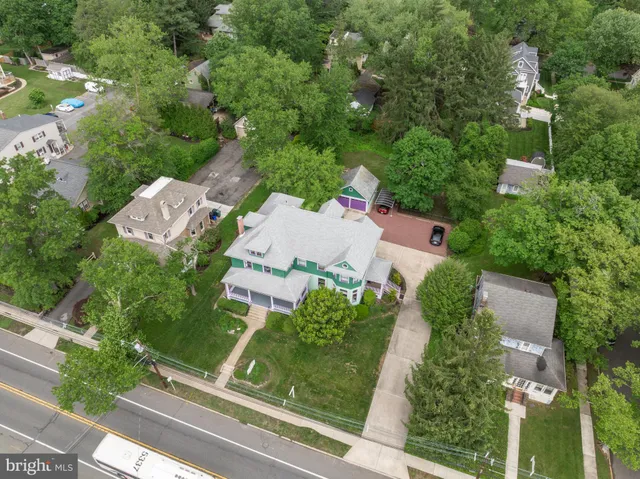 an aerial view of a house with a garden