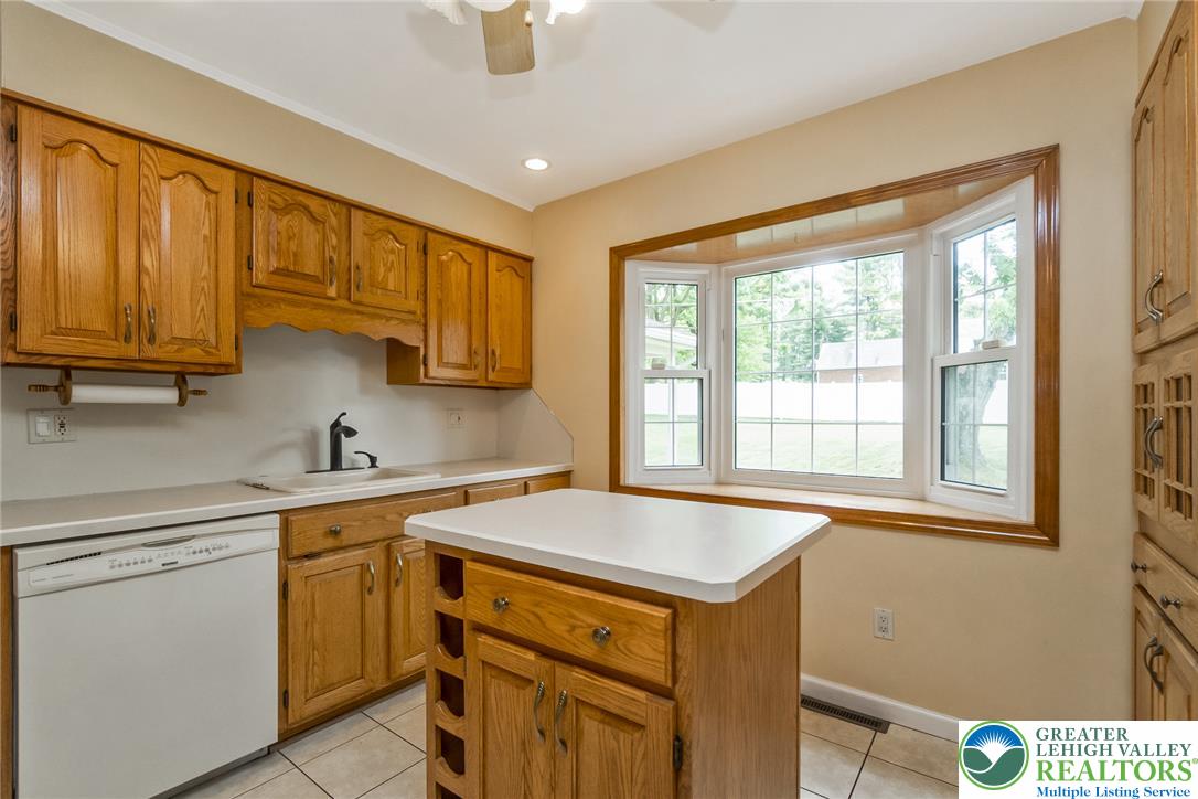 268 Apollo Drive Bethlehem, PA 18017 - Photo 15 of 56 The well-appointed kitchen also features ar bight bay window overlooking the yard.