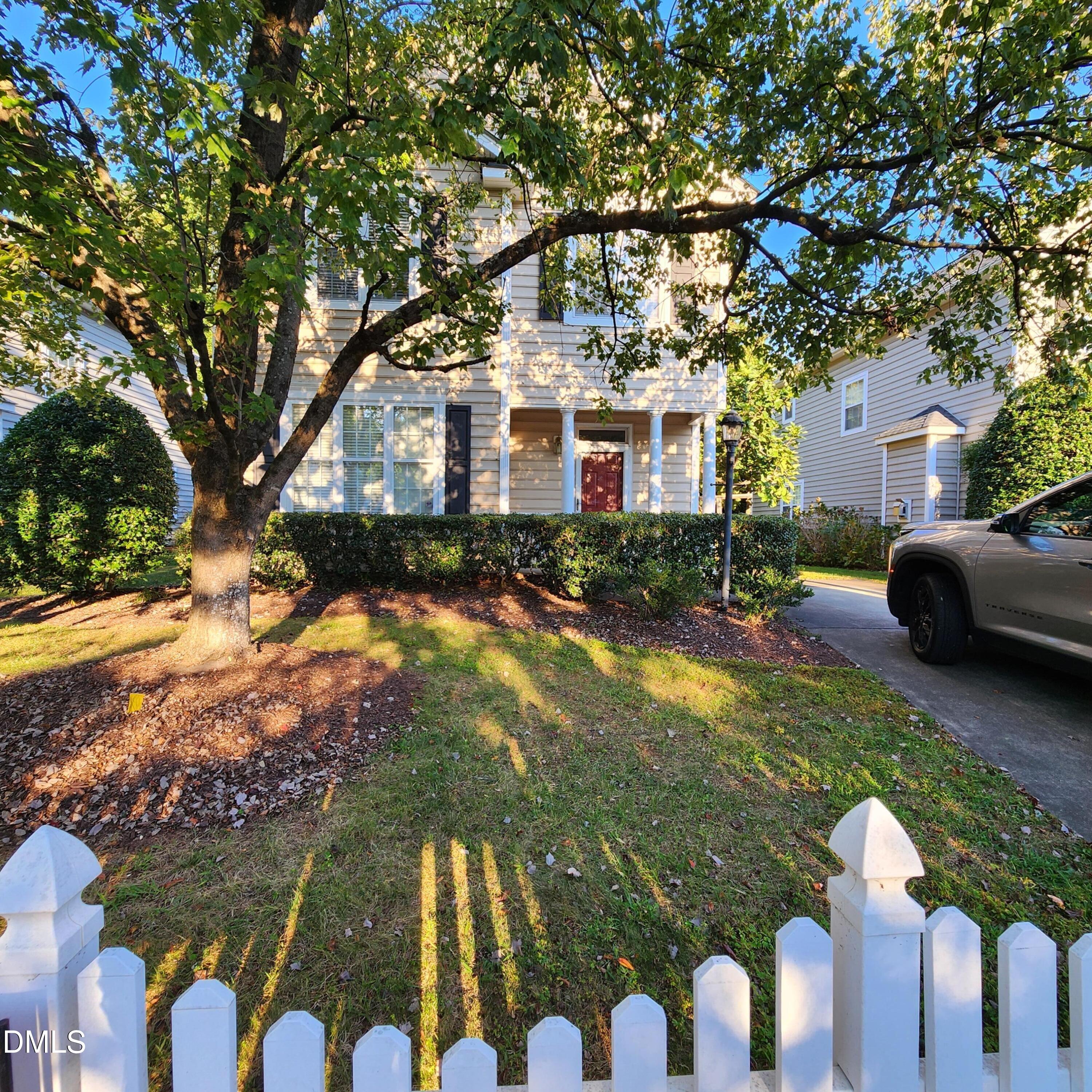 4916 Morning Edge Drive Raleigh, NC 27613 - Photo 3 of 26 a front view of house with yard and green space
