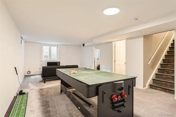a room with furniture and window