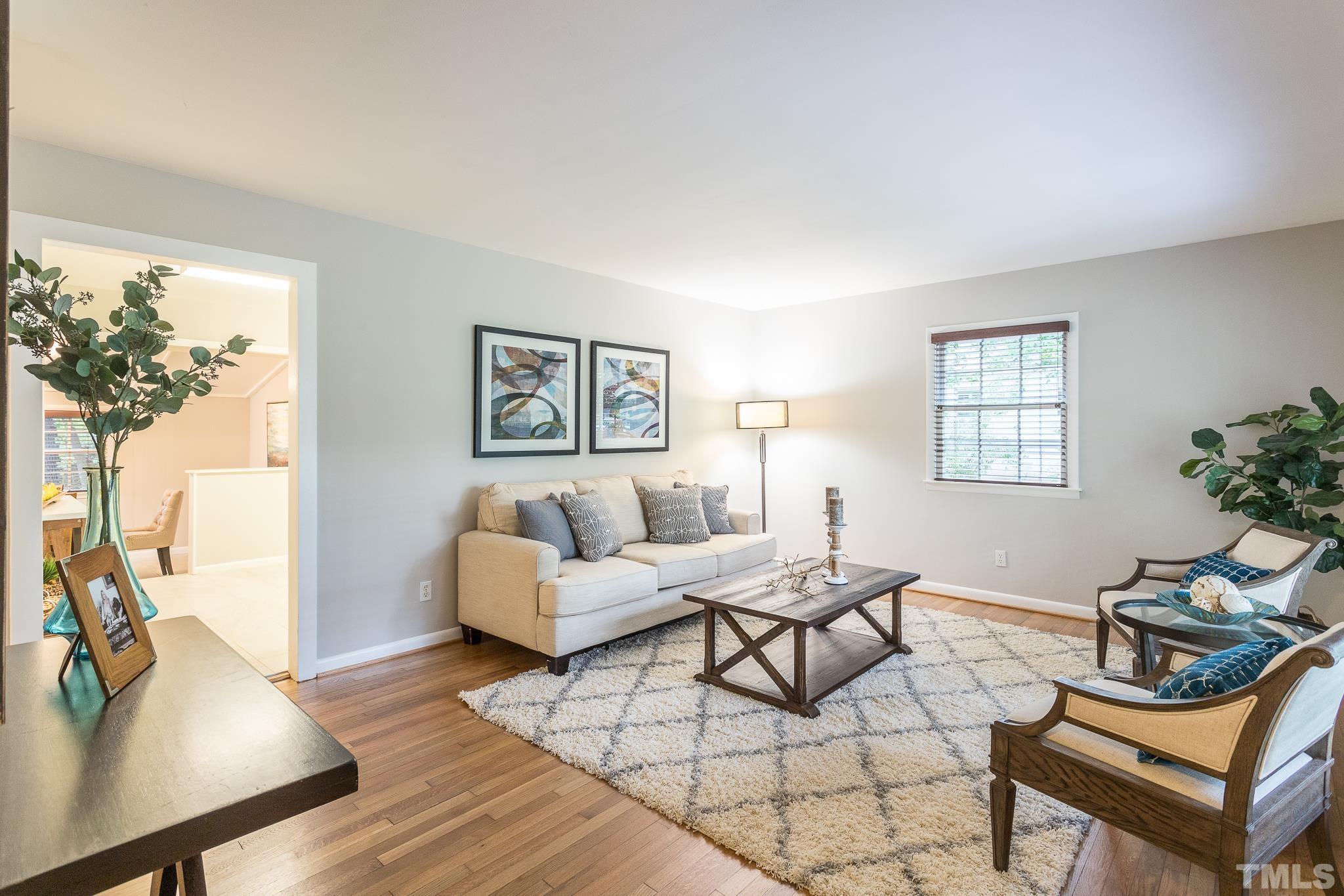 636 Duke Drive Raleigh, NC 27609 - Photo 5 of 19 Living Room opens to Kitchen & Breakfast Area