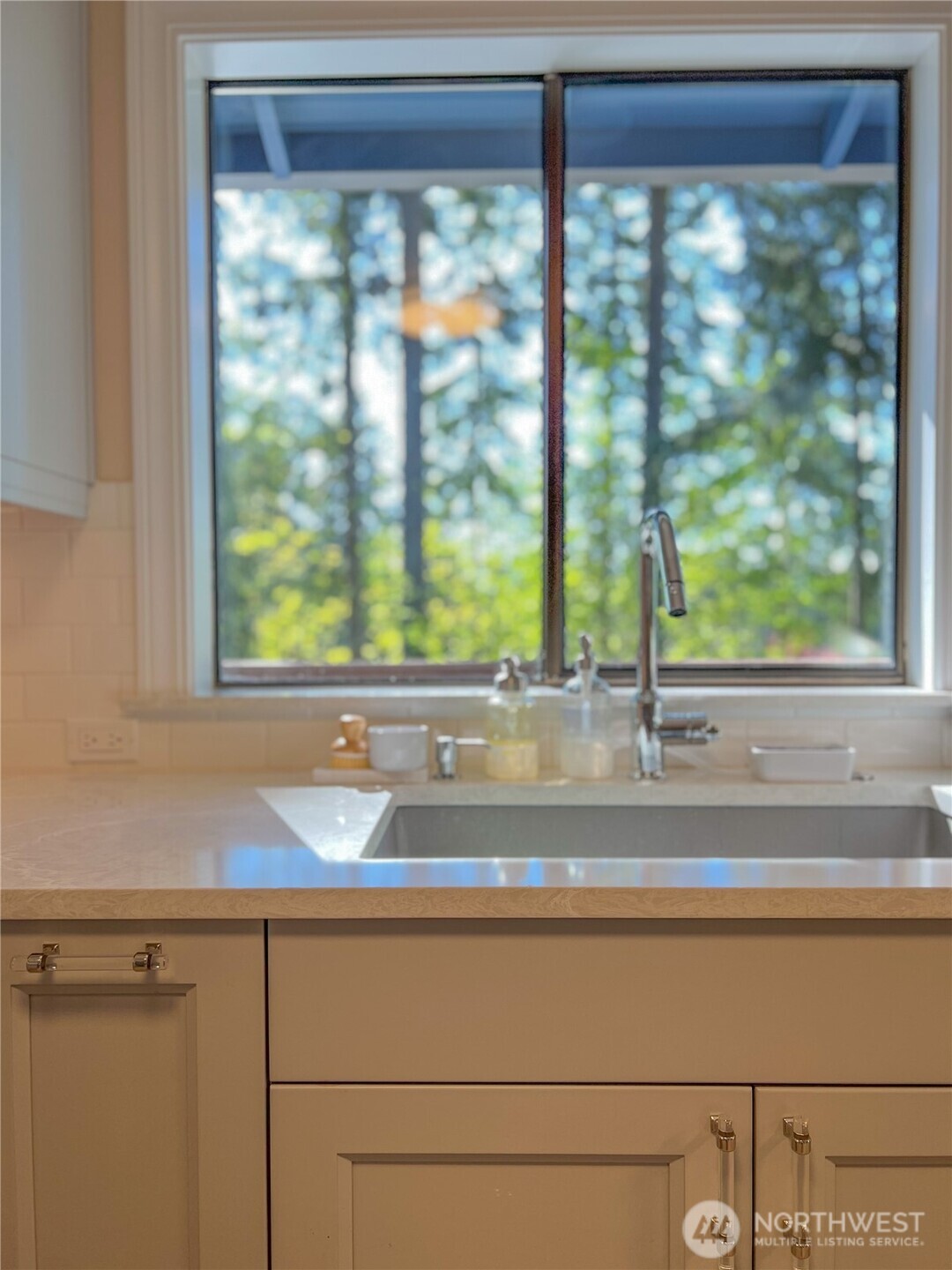 9550 132nd Avenue Southeast Renton, WA 98059 - Photo 16 of 34 a sink sitting next to a window