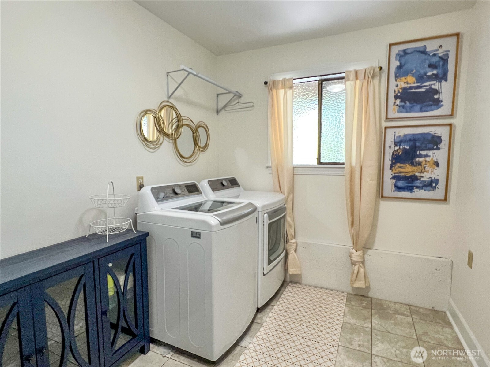 9550 132nd Avenue Southeast Renton, WA 98059 - Photo 30 of 34 a utility room with dryer and washer
