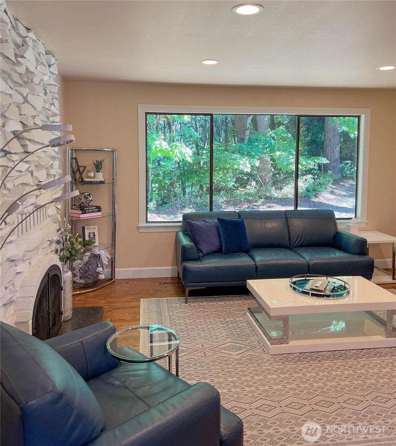 9550 132nd Avenue Southeast Renton, WA 98059 - Photo 6 of 34 a living room with furniture and a large window