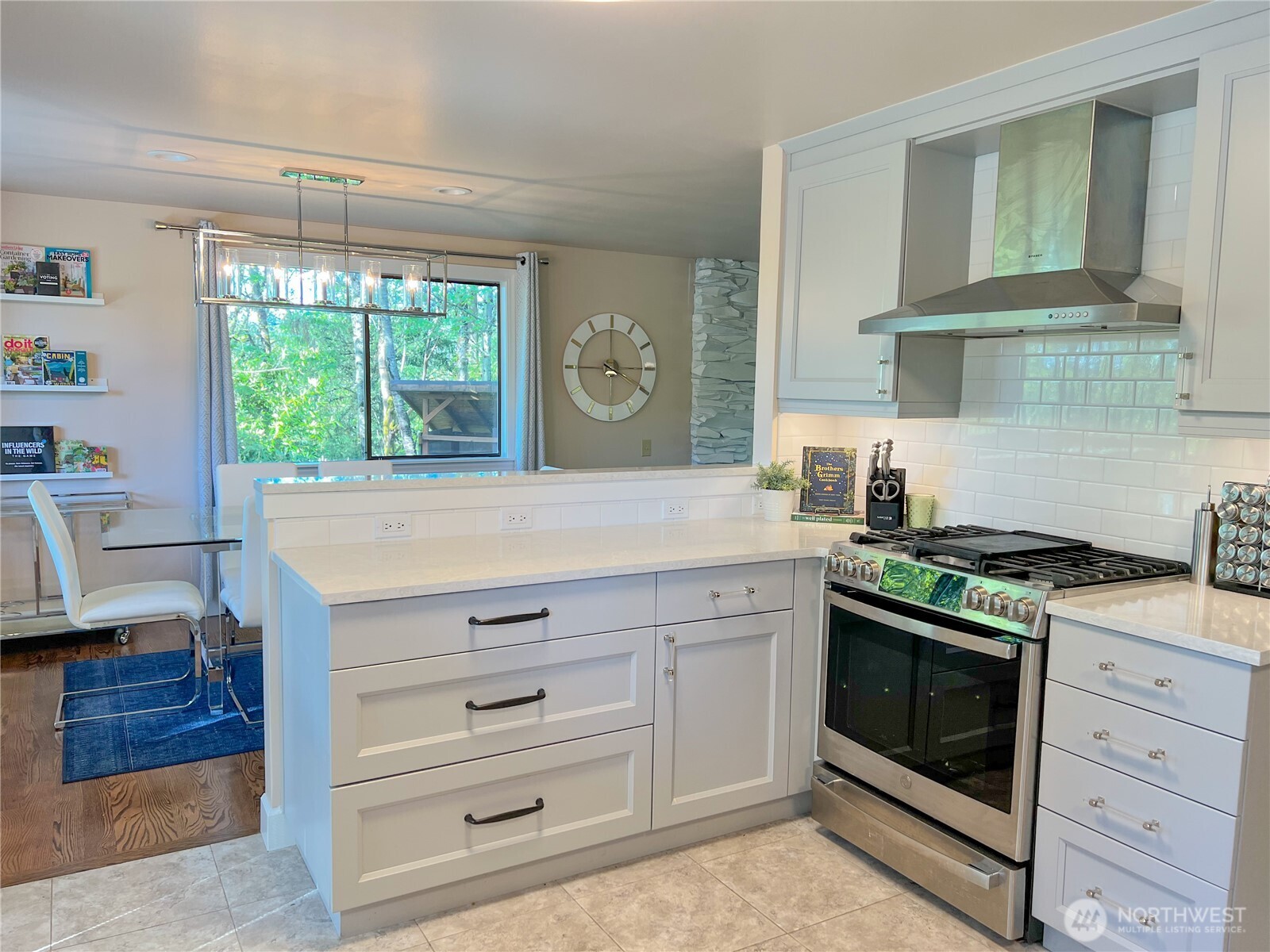 9550 132nd Avenue Southeast Renton, WA 98059 - Photo 8 of 34 a kitchen with a stove and a sink
