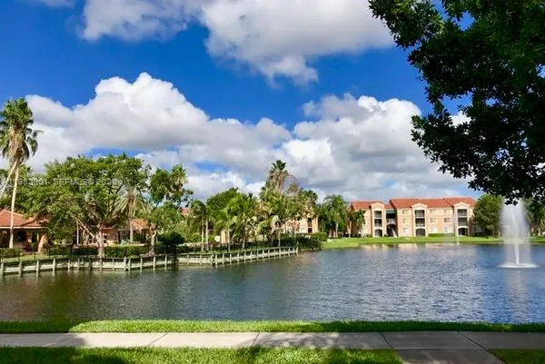 a view of residential houses with outdoor space