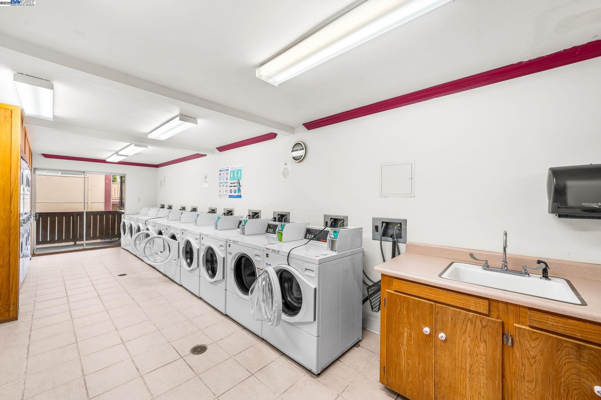 1327 Webster Street, Unit B101 Alameda, CA 94501 - Photo 19 of 26 a utility room with washer and dryer