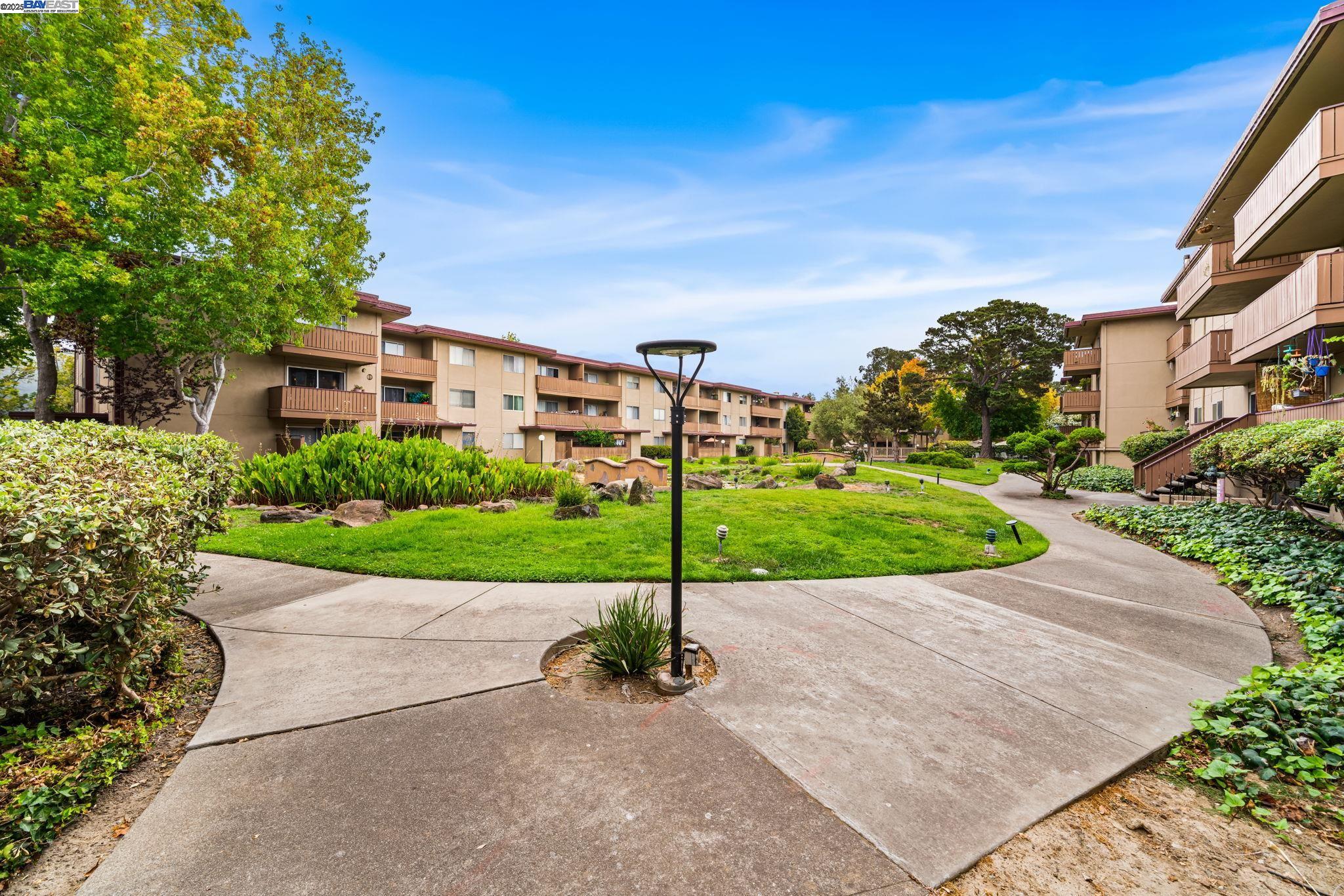 1327 Webster Street, Unit B101 Alameda, CA 94501 - Photo 21 of 26 a view of a park with a apartment
