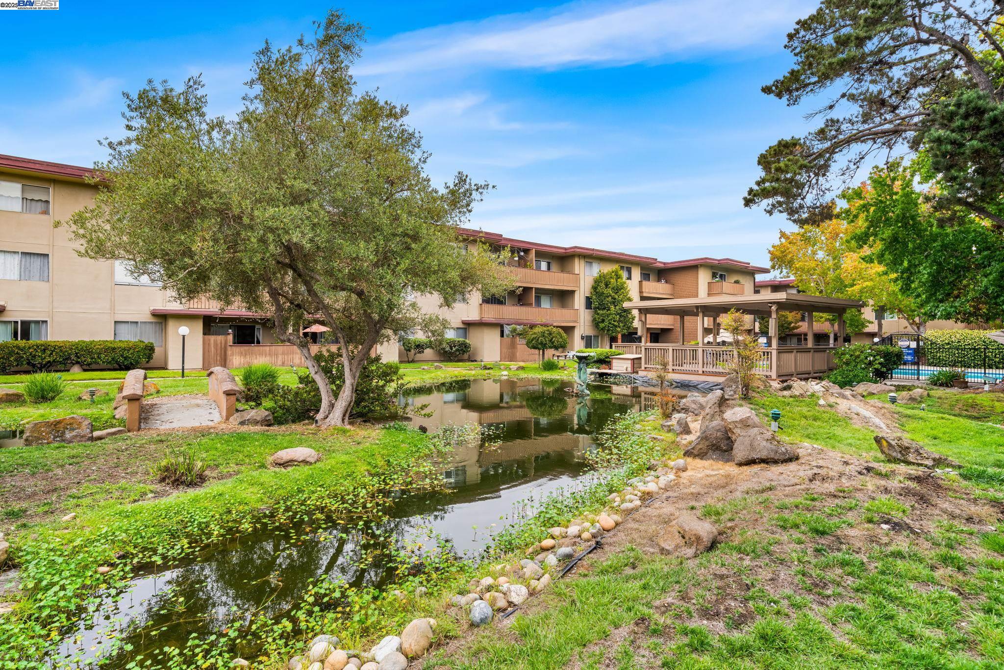 1327 Webster Street, Unit B101 Alameda, CA 94501 - Photo 23 of 26 a view of backyard of a house with a garden