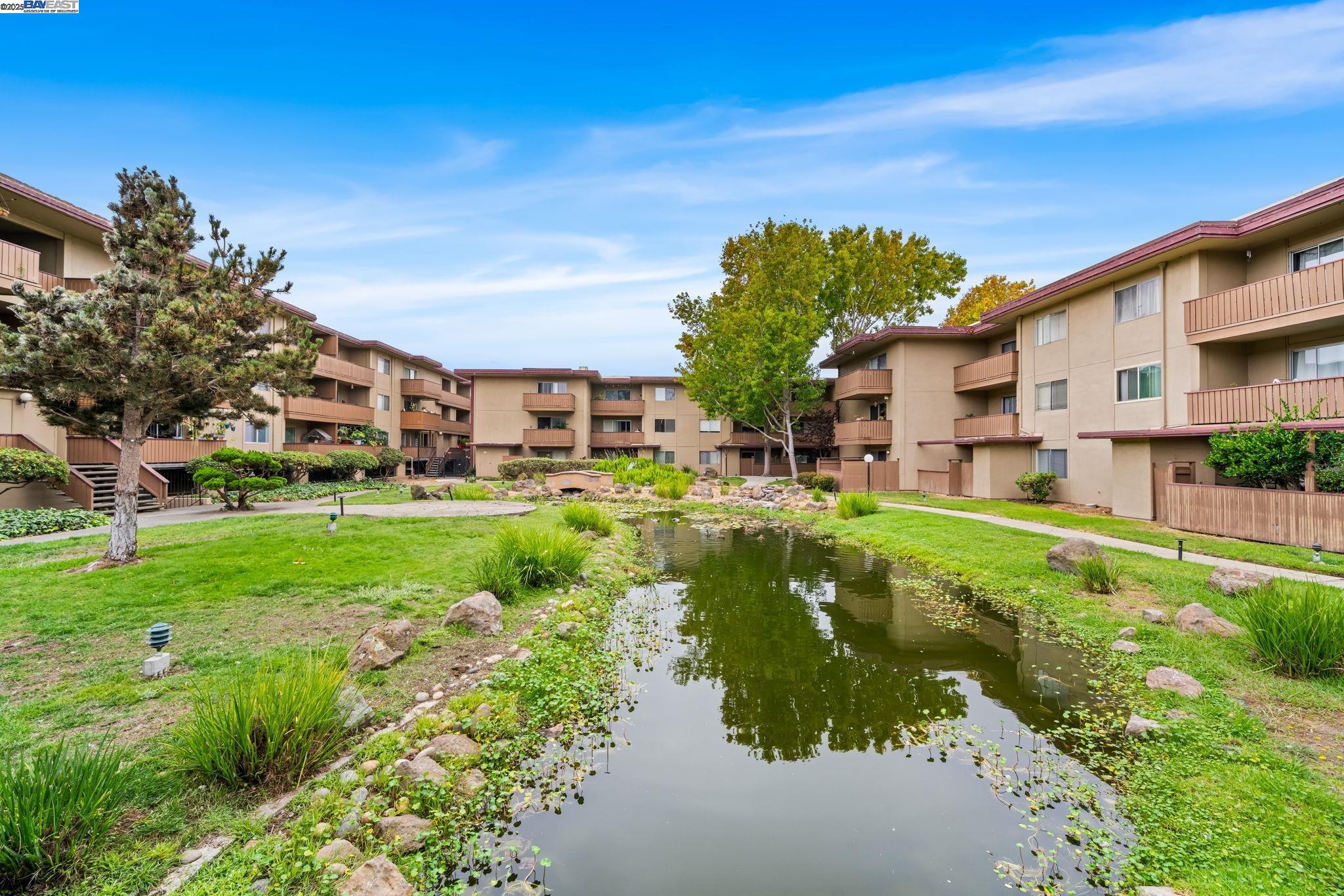 1327 Webster Street, Unit B101 Alameda, CA 94501 - Photo 25 of 26 a view of a house with a big yard