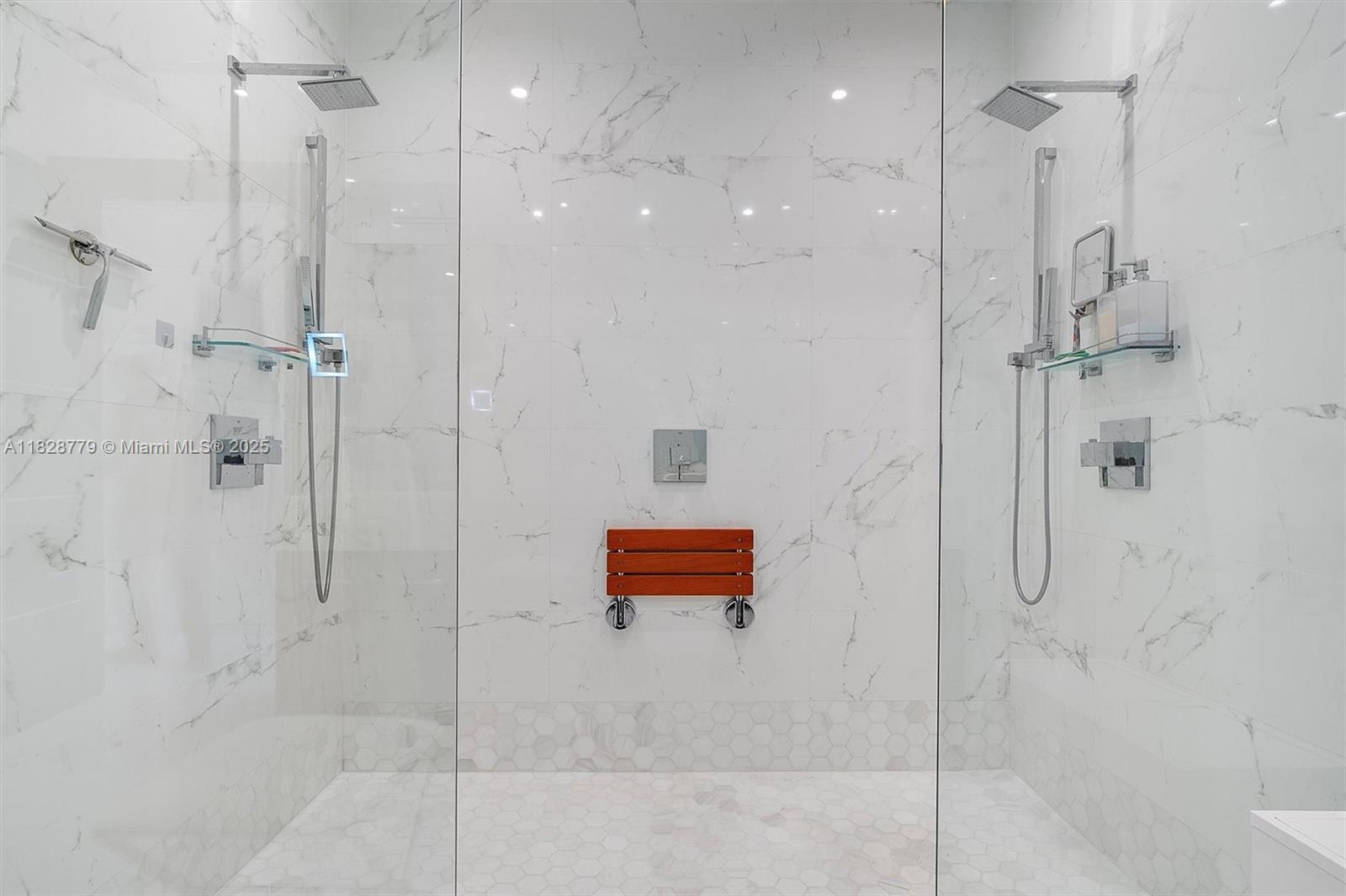 900 Brickell Key Boulevard, Unit 3103 Miami, FL 33131 - Photo 30 of 55 a bathroom with a shower