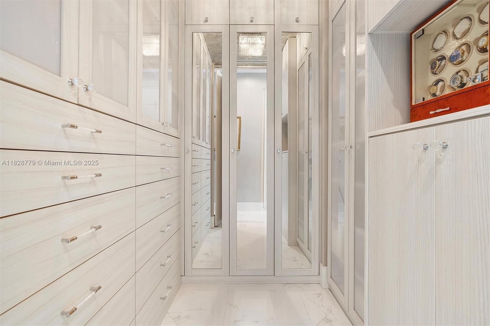 900 Brickell Key Boulevard, Unit 3103 Miami, FL 33131 - Photo 32 of 55 a view of a closet