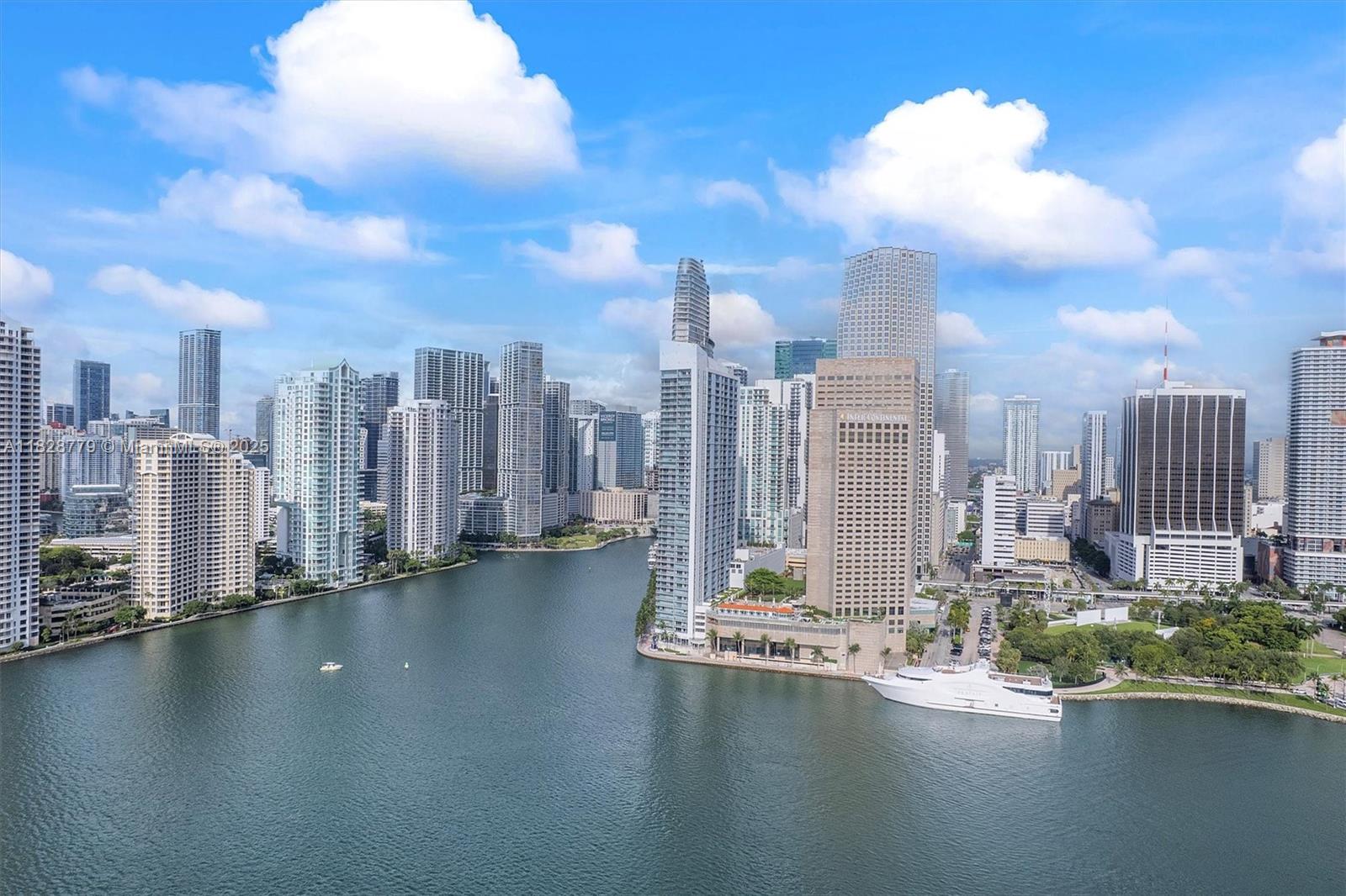 900 Brickell Key Boulevard, Unit 3103 Miami, FL 33131 - Photo 51 of 55 a view of a city with tall buildings