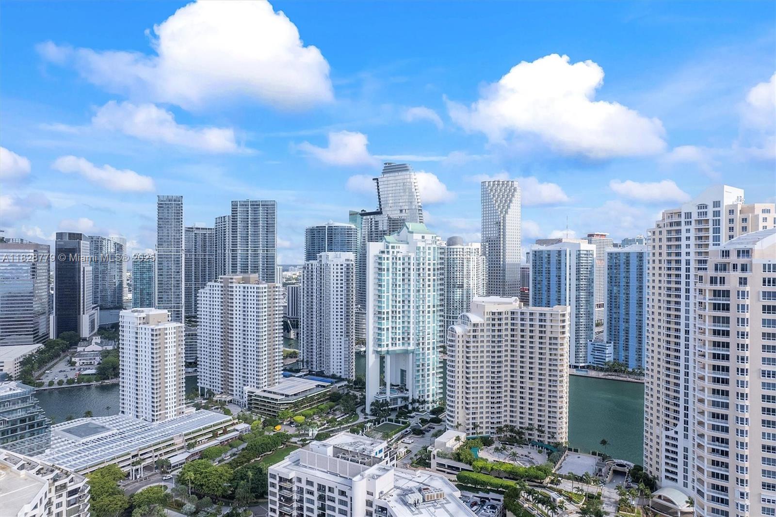 900 Brickell Key Boulevard, Unit 3103 Miami, FL 33131 - Photo 52 of 55 a view of a city with tall buildings