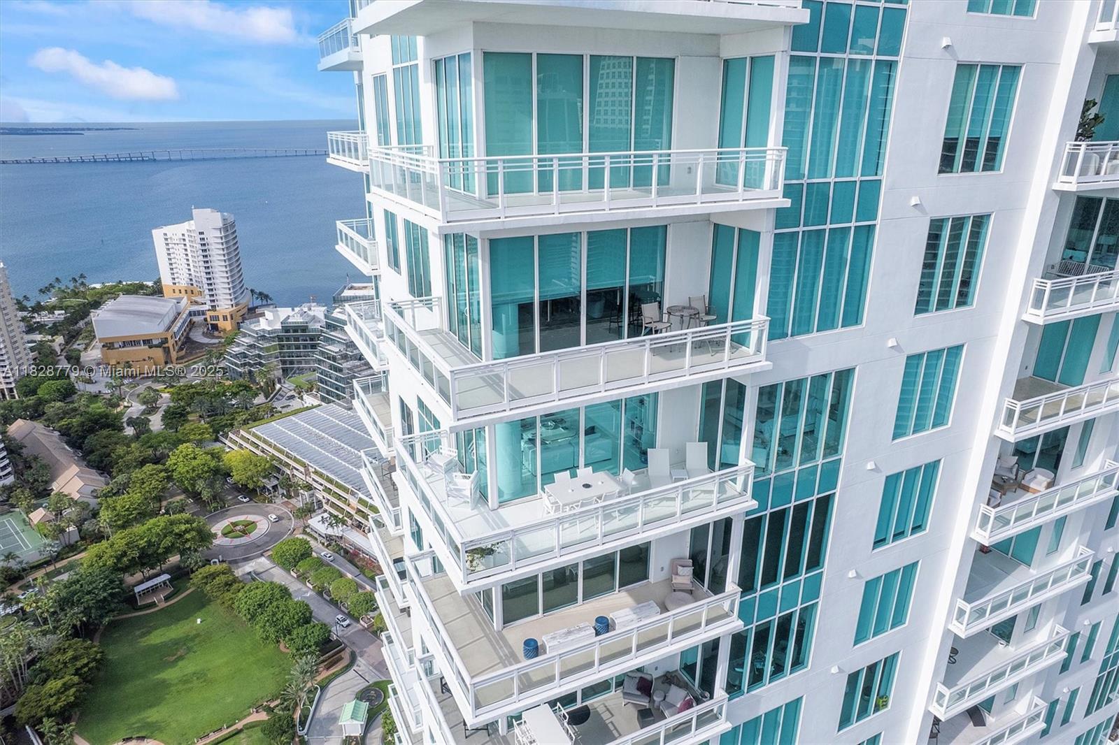 900 Brickell Key Boulevard, Unit 3103 Miami, FL 33131 - Photo 54 of 55 a front view of a multi story building