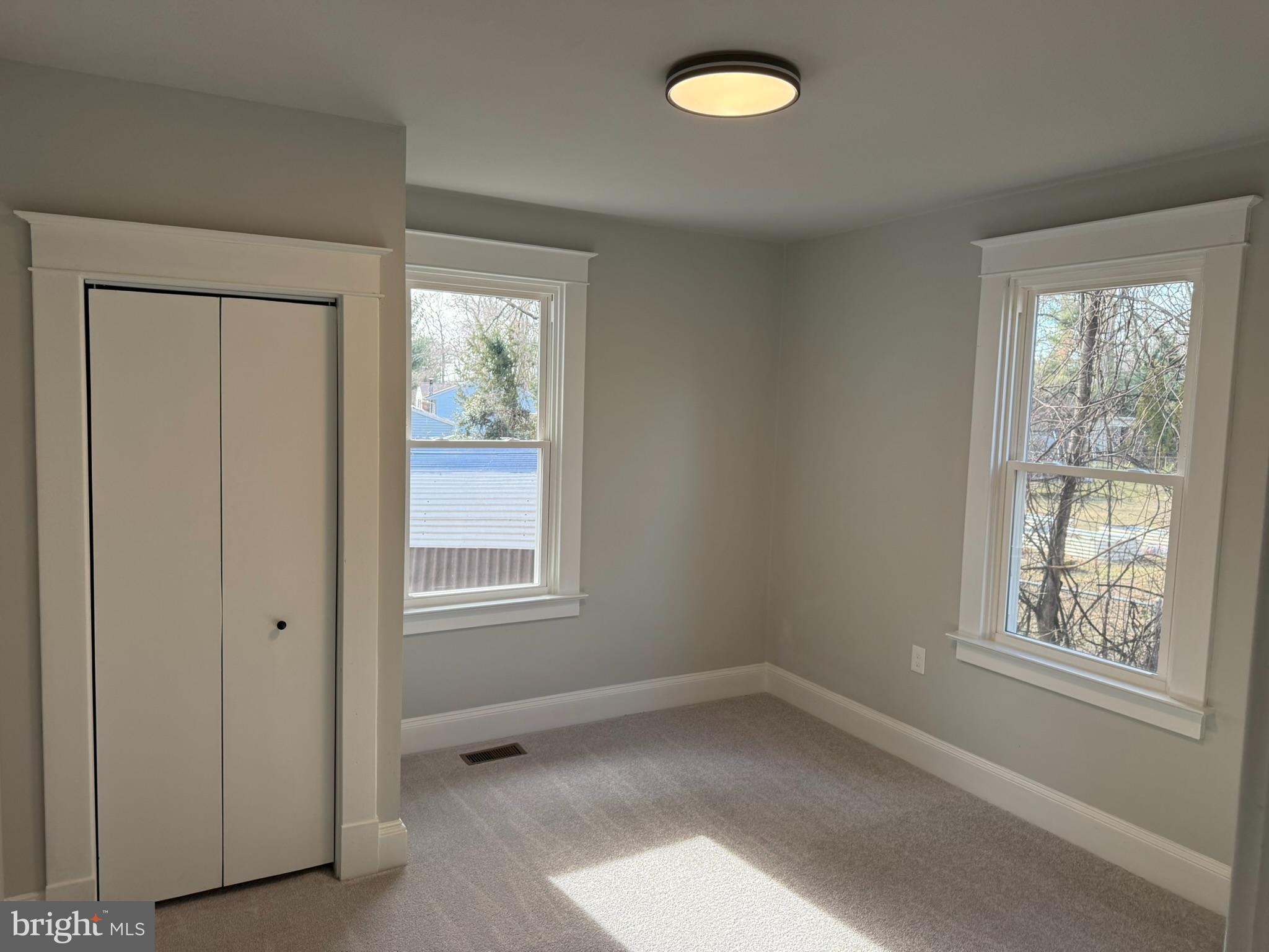 205 Wicklow Road Glen Burnie, MD 21061 - Photo 11 of 52 an empty room with windows