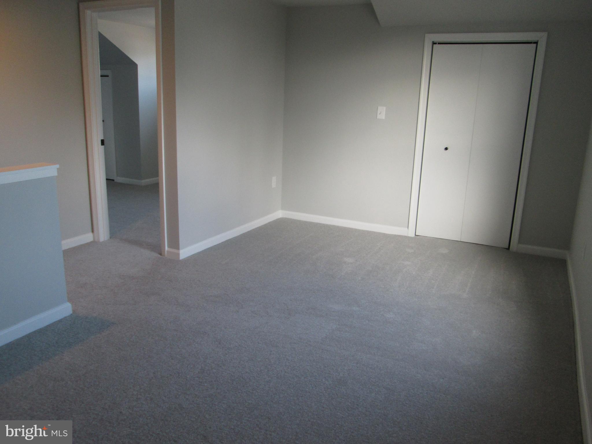 205 Wicklow Road Glen Burnie, MD 21061 - Photo 23 of 52 a view of an empty room and closet area