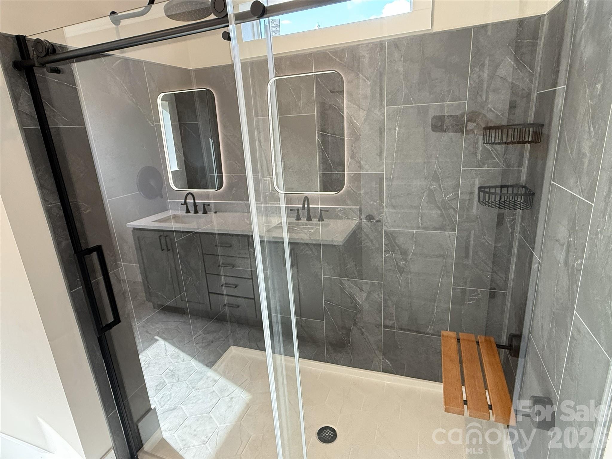 4271 Alpine Trail Morganton, NC 28655 - Photo 16 of 36 a bathroom with a shower and a sink