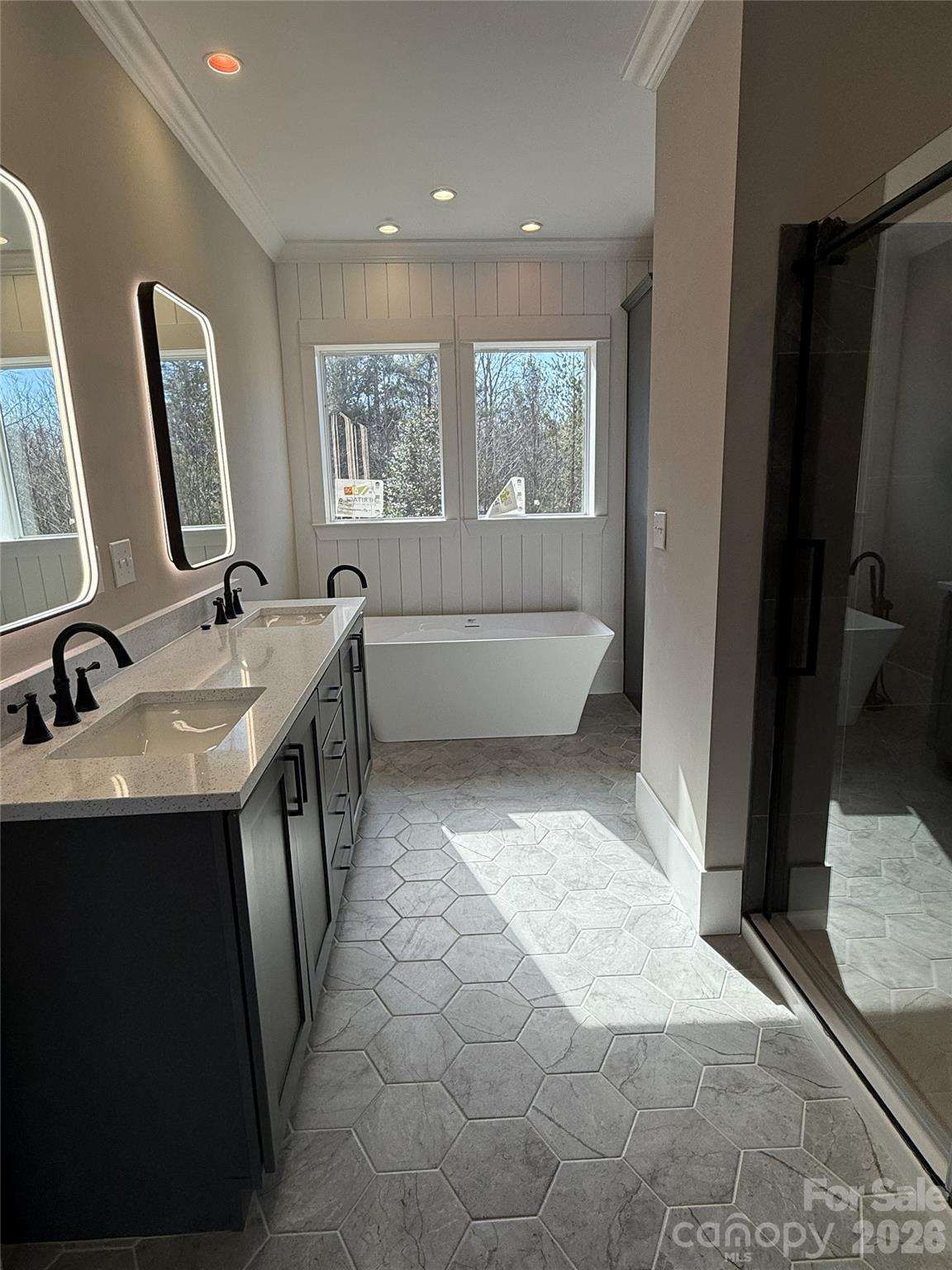 4271 Alpine Trail Morganton, NC 28655 - Photo 17 of 36 a bathroom with a bathtub sink and mirror