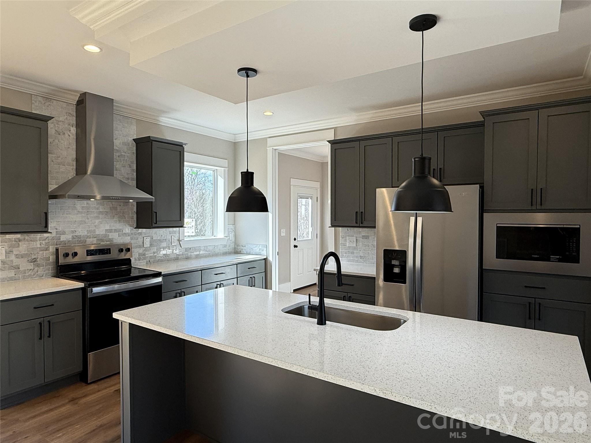 4271 Alpine Trail Morganton, NC 28655 - Photo 2 of 36 a kitchen with stainless steel appliances a sink stove and refrigerator