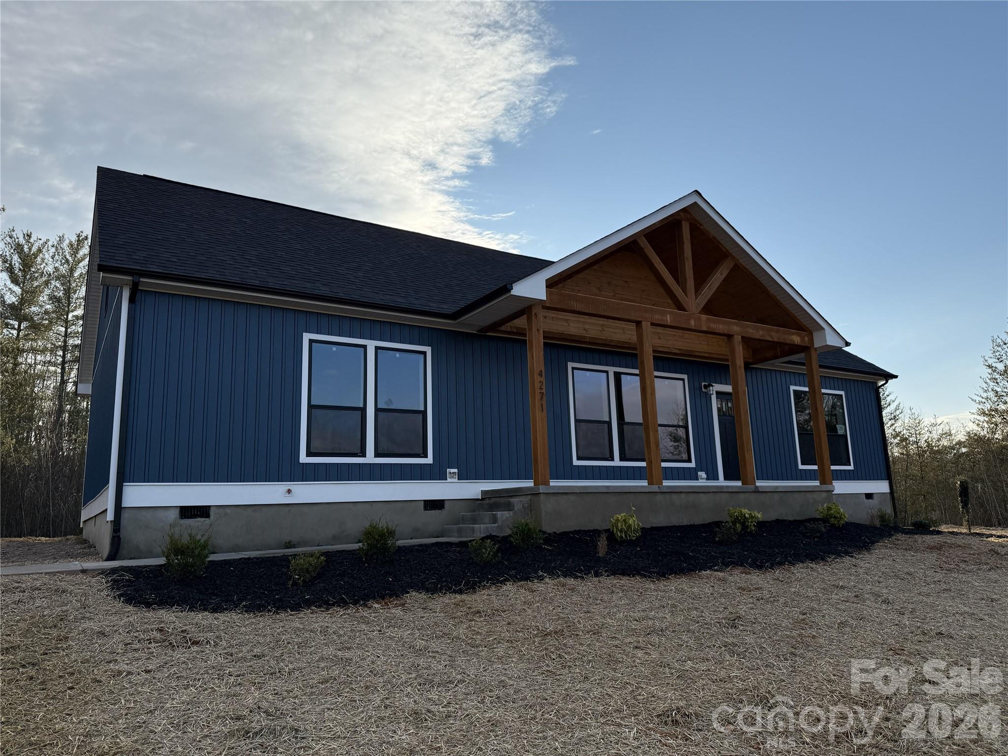 4271 Alpine Trail Morganton, NC 28655 - Photo 27 of 36 a front view of a house with a yard