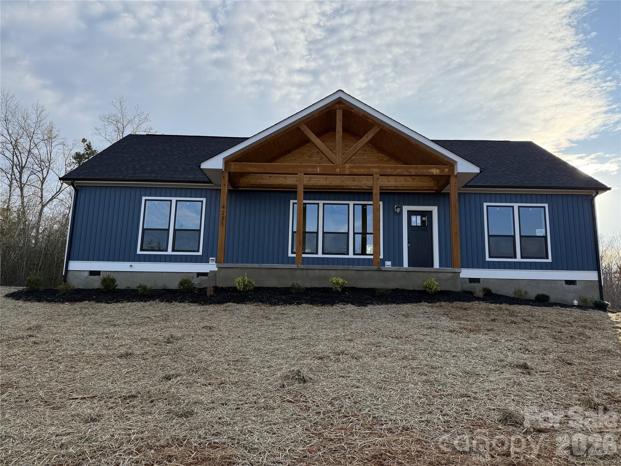4271 Alpine Trail Morganton, NC 28655 - Photo 28 of 36 a front view of a house with a yard