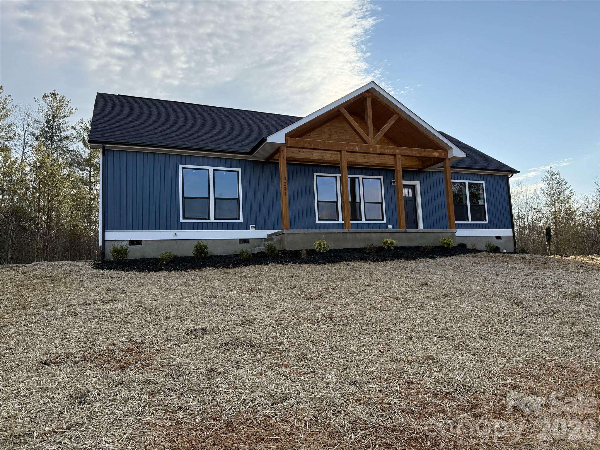 4271 Alpine Trail Morganton, NC 28655 - Photo 29 of 36 a front view of a house with a yard