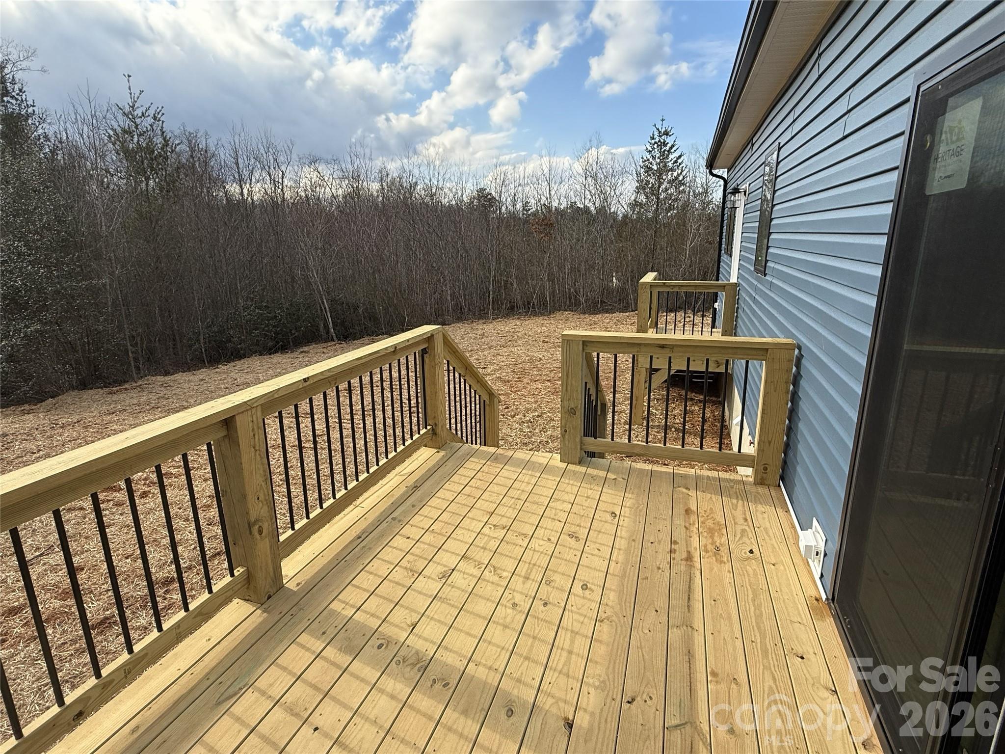 4271 Alpine Trail Morganton, NC 28655 - Photo 36 of 36 a view of balcony with wooden floor and yard in the back