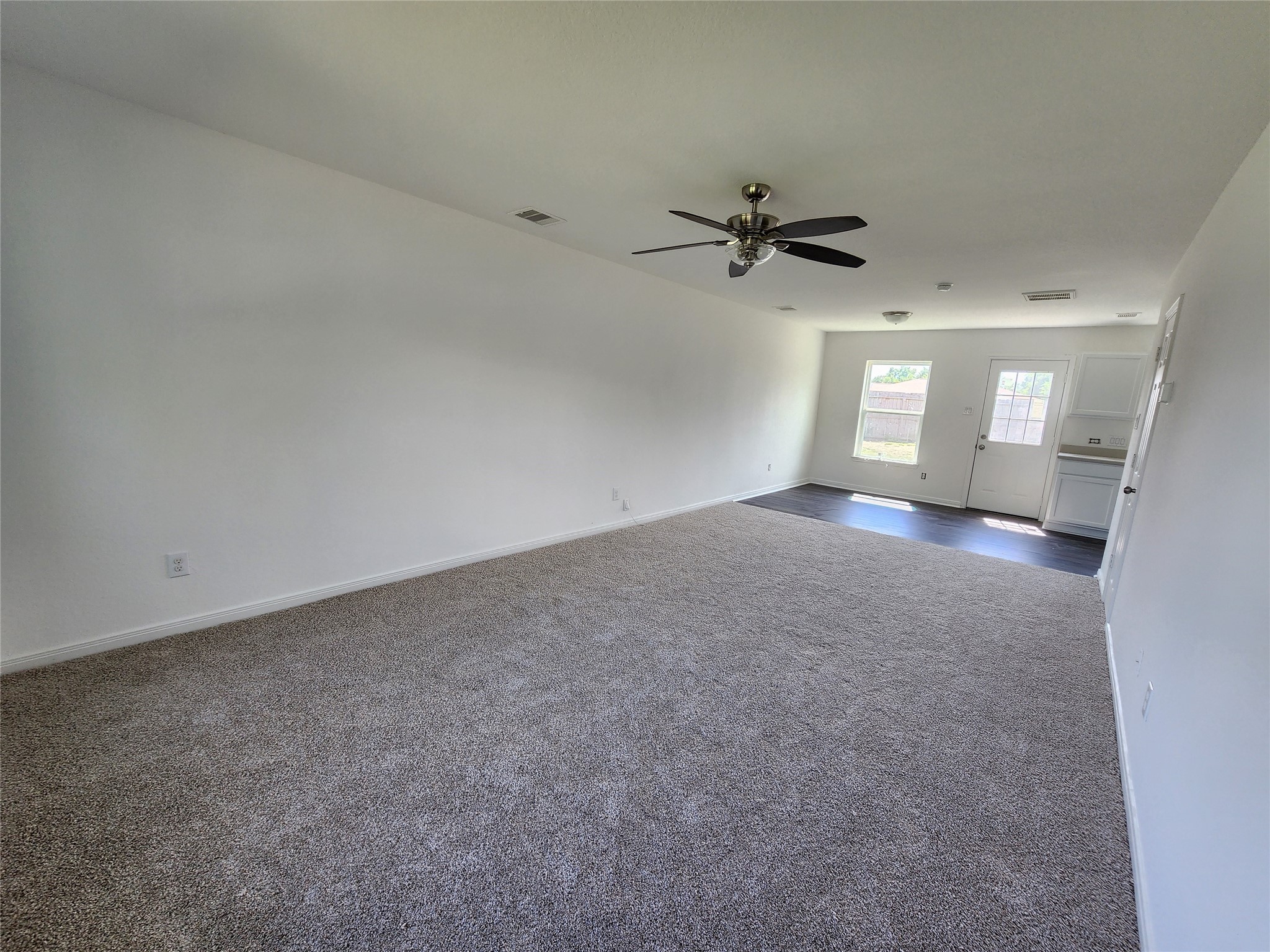 207 Branch Circle Kendleton, TX 77451 - Photo 2 of 12 wooden floor in an empty room
