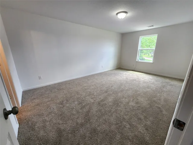 a bathroom with a sink a light fixture and a mirror